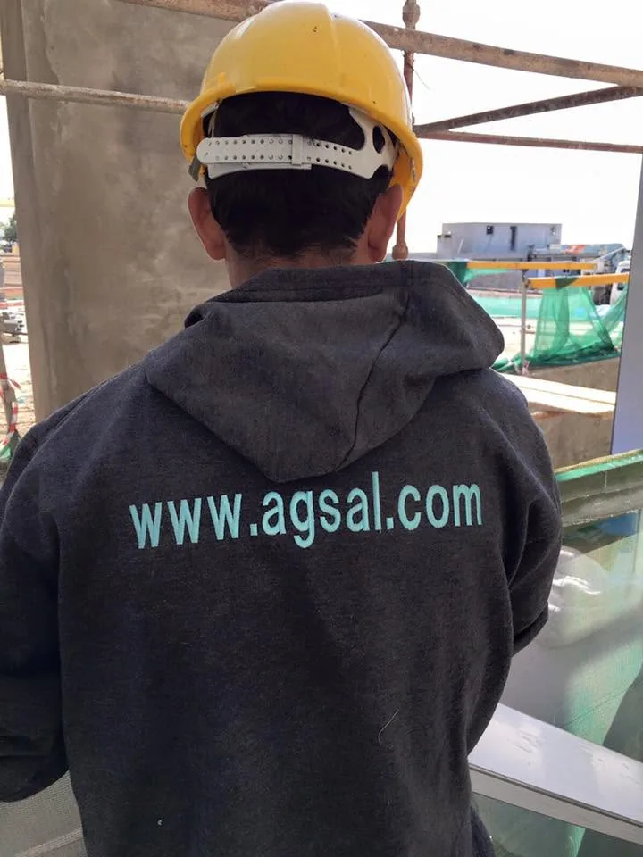 AG crew member on site in an agsal.com hoodie