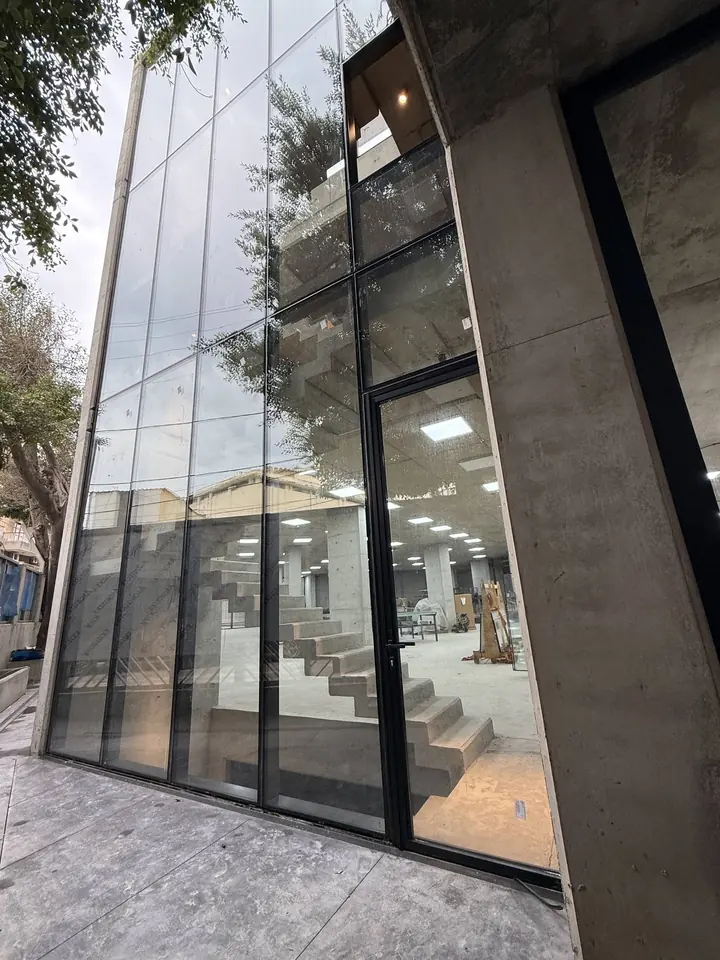 Concrete column and full-height glazing at the AG Building